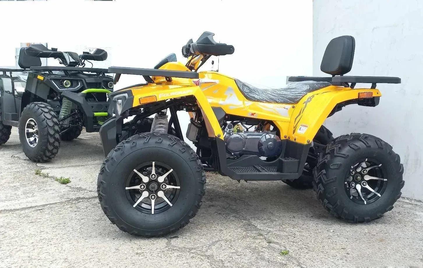 Tao Motor Shark 200 ATV u žutoj boji sa strane, sa aluminijumskim felnama